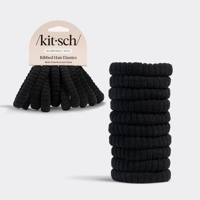 Stack of Kitsch black ribbed hair elastics with 'kit-sch' packaging on a gray background