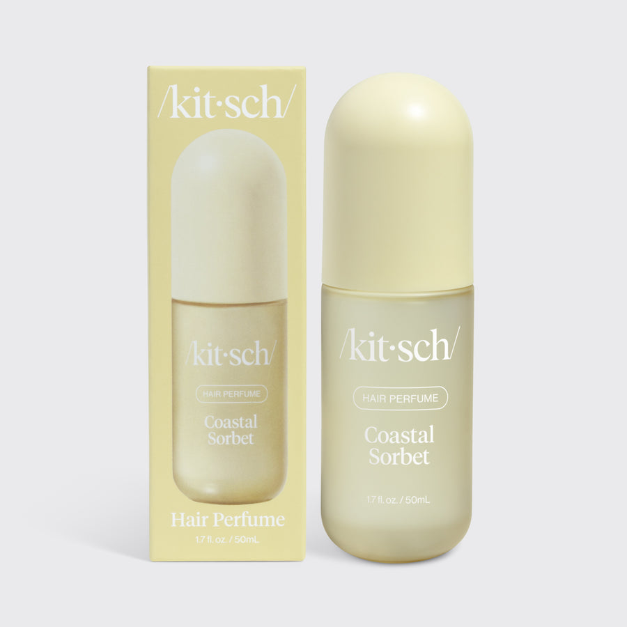 Kitsch Coastal Sorbet Hair & Body Perfume Mist bottle on a soft warm background