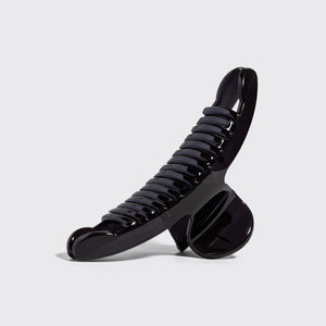 Side view of kitsch translucent Black Arched Claw Clip - Large showing curved teeth and hinge