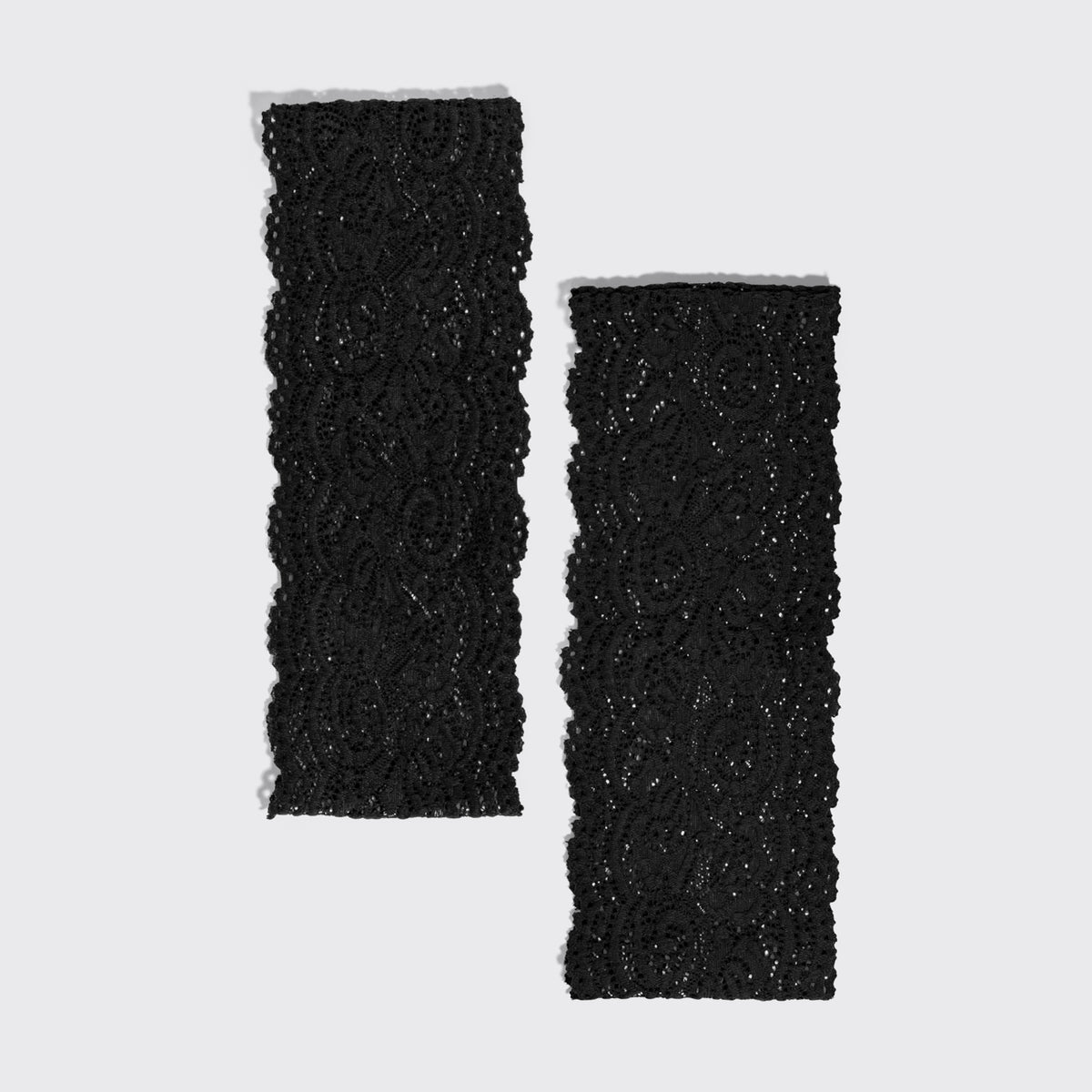 KITSCH Black Wide Lace Headbands 2pc Set — the two black lace headbands laid side by side — delicate texture adds a romantic yet modern touch to any style — choosing between the two widths