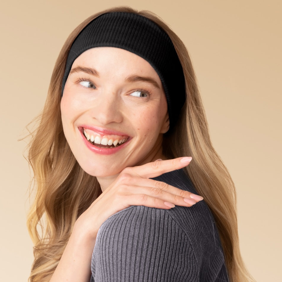 KITSCH Recycled Fabric Ribbed Elastic Headbands 2pc Set — lifestyle shot of a model wearing the Black ribbed headband — comfortable stretch fit that holds hair back without pulling