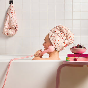 KITSCH XL Hair Towel Wrap and Satin Lined Flexi Shower Cap — Cherry Print — model wearing both pieces, post-shower routine
