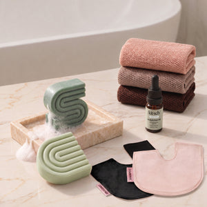 Rosemary & Biotin: Kitsch Winter Welcome Kit with Rosemary & Biotin shampoo and conditioner bars, Rosewood African Net Sponge, shampoo and conditioner bar bags, and Rosemary & Biotin Scalp & Hair Oil.